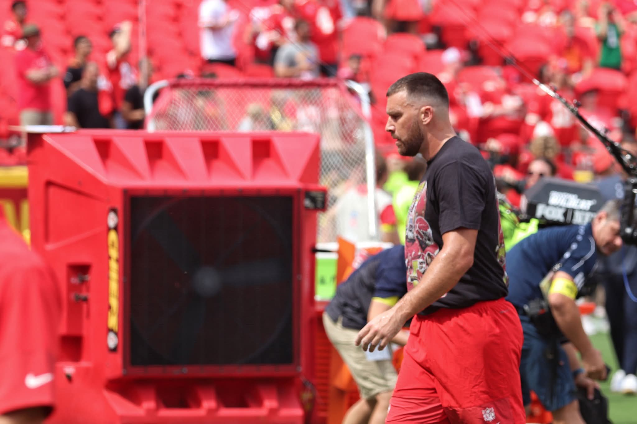 Travis Kelce sported a warmup t-shirt with photos of Rice, along with the phrase “Free 4.”(Marleah Campbell)